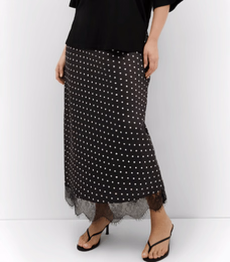Solene Spot Lace Hem Skirt at City Chic